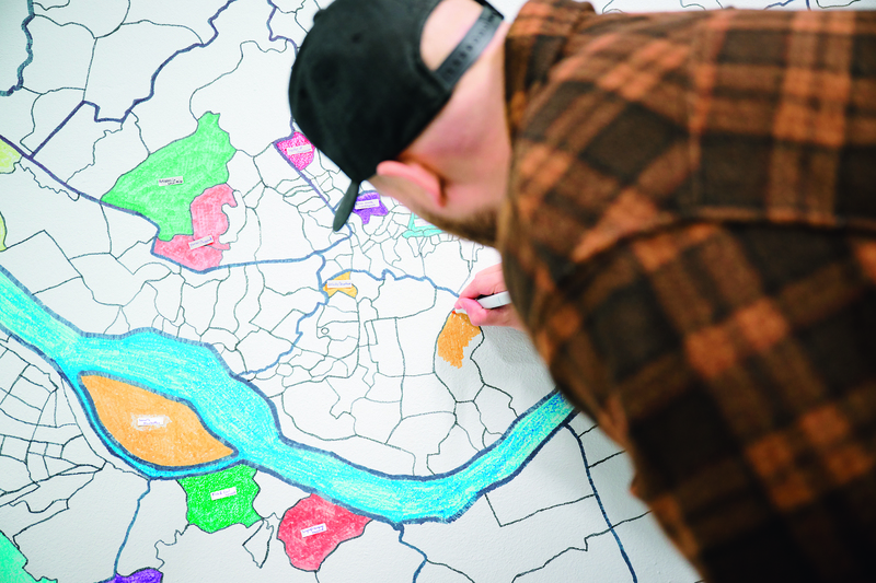 His handdrawn map gets a splash of color after each of his visits